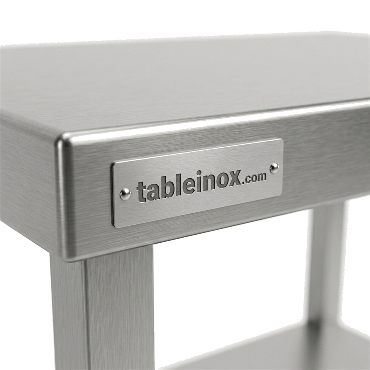Plaque signalétique inox gravée tableinox.com rivetée sur la tranche du plateau