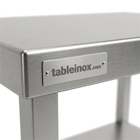 Plaque signalétique inox gravée tableinox.com rivetée sur la tranche du plateau